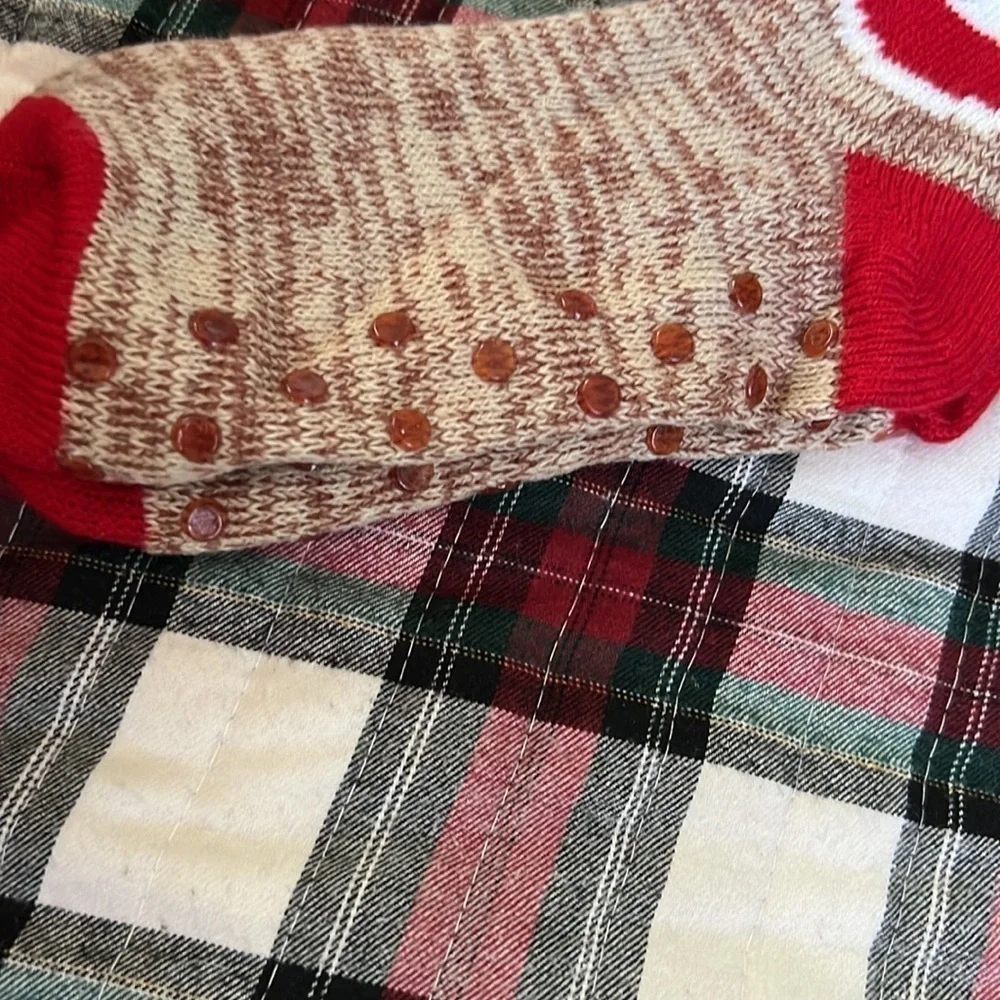 The sock monkey has rubber on the bottom for slip resistant.